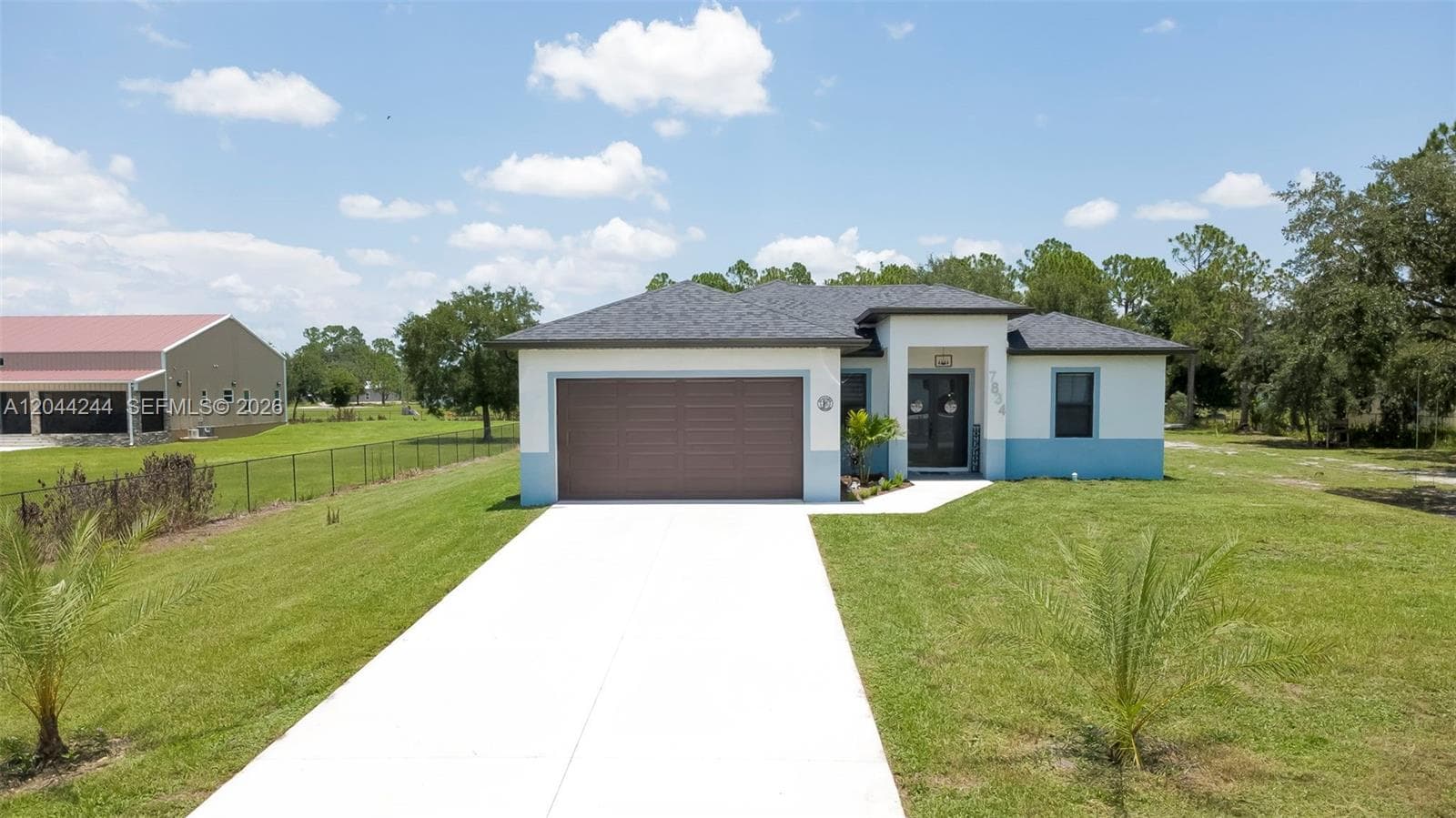 Single-family home at 7834 14TH PL, La Belle, FL